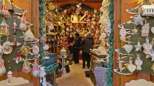 4K Moving into a traditional European Christmas market stall shop, ornaments filled floor to ceiling