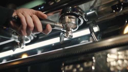 Coffee machine on a wooden table Slow motion.