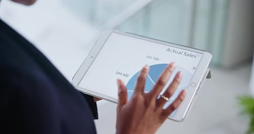Hands, tablet screen and statistics graphs for financial goals at corporate company or analytics