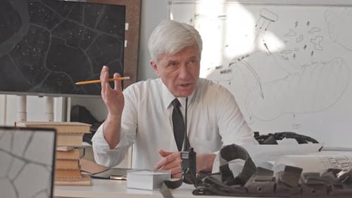 Professor at Military Academy Speaking to Students during Seminar