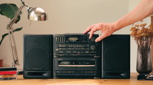 Retro Radio Tape Recorder Audio Cassette Closeup Listening to Music Old Radio Boom Box Player Macro