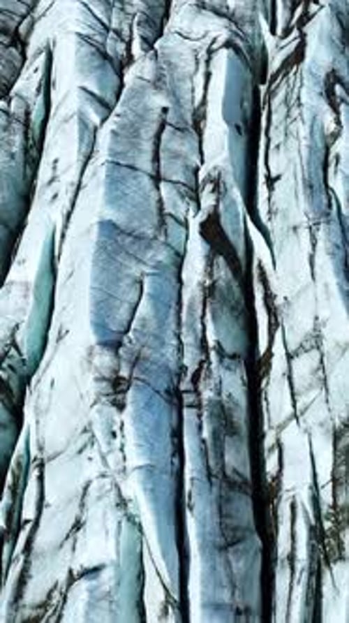 Vertical Screen Vatnajokull Glacier in Iceland Pure Blue Ice Winter Landscape Aerial View Largest
