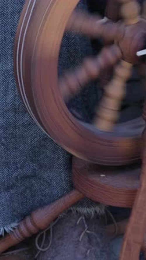 Wooden Spinning Wheel in Motion