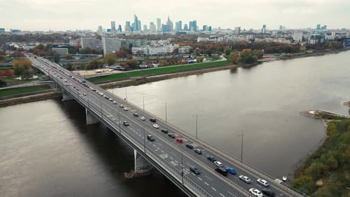 Aerial drone top view of highway multilevel junction in urban populated area, City panorama backgrou