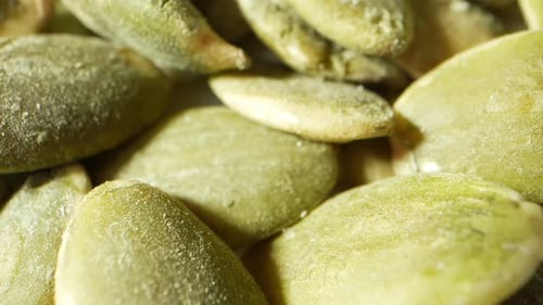Green pumpkin kernels, through the probe lens.