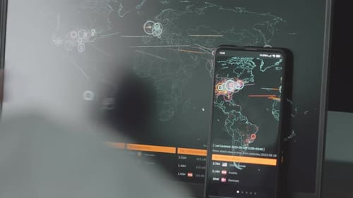 Hand Interacting With Global Cybersecurity Attack Map