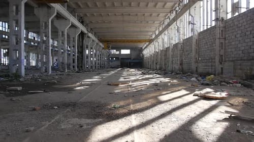 Destruction and debris in crumbling halls, abandoned scary place - urban exploration (slow motion)