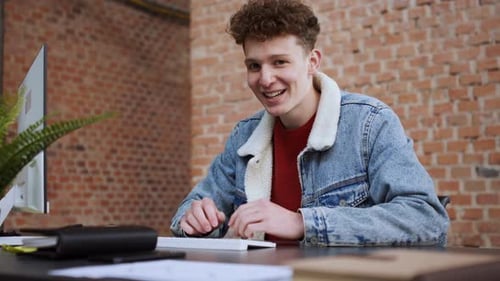Successful Businessman Working at Desk