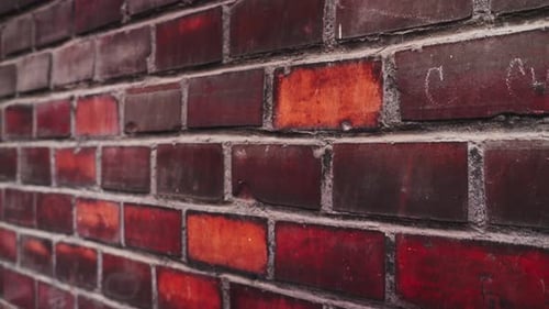 Rustic red brick wall, close-up shot of brickwork. Close up shot