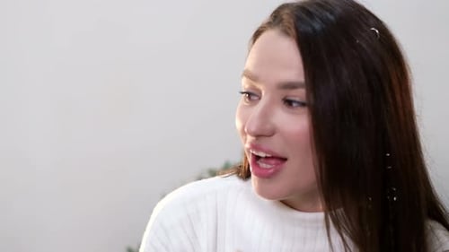 Young Woman Talking Indoors Smiling