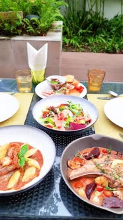 Display of Food Dishes Set on Table Outside
