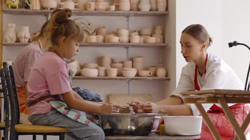 Kids Learn Pottery Skills at a Creative Workshop in an Art Studio