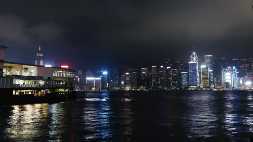 Stunning Night Skyline of Hong Kong Harbour with Illuminated Skyscrapers