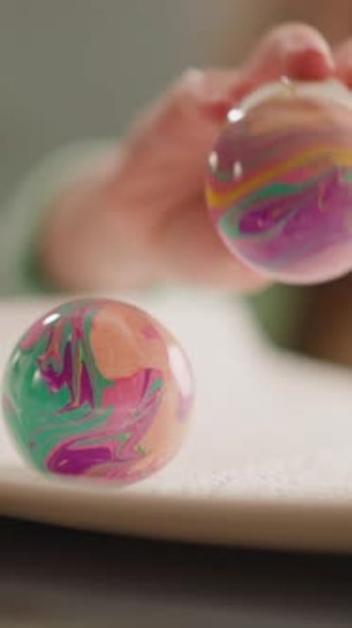 Decorating Easter Eggs with Colorful Paint Patterns