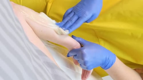 Delicate Bright Depilation in a Cosmetology Office Waxing Master Vertical Video