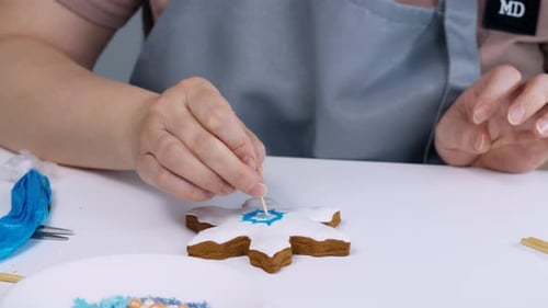 Timelapse Woman Decorates Christmas Gingerbread Snowflake Shape
