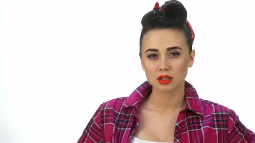 Young Woman with Retro Hairstyle and Red Lipstick