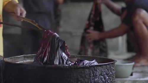 Dying the Fabric for Batik Process in a Traditional Stove