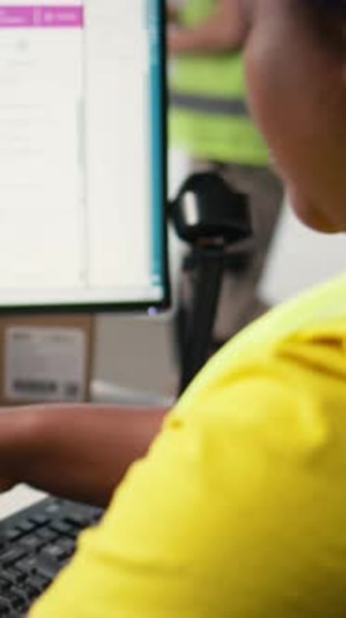 Vertical Video Black Woman Packing Goods and Applying Shipping Labels on Boxes