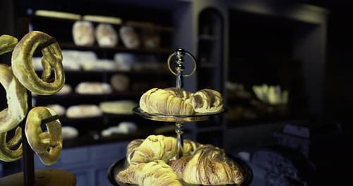 Display of Freshly Baked Pastries in a Cozy Bakery Setting