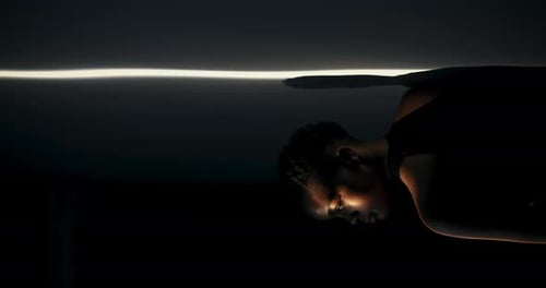 Abstract Woman Lit in the Dark