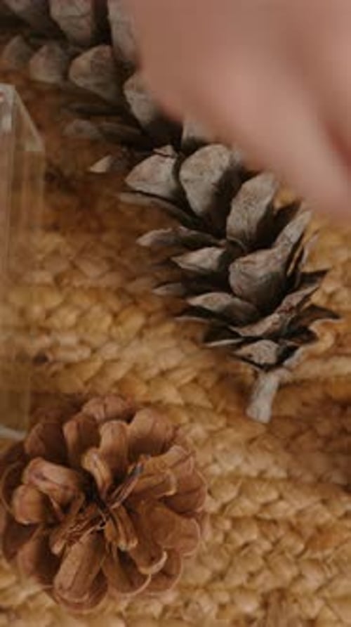 Top-Down View of Natural Pinecone Table Decoration for a Festive New Year Celebration