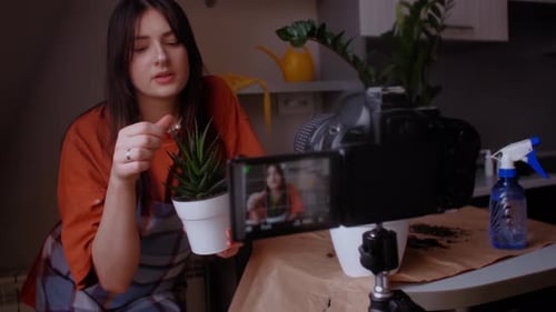 Woman Films Houseplant Vlog in her Home