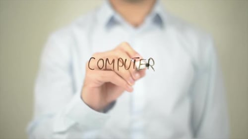 Computer Man Writing on Transparent Screen