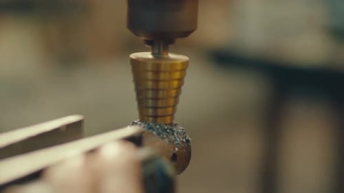 Drilling Hole in Metal with Spiral Step Bit