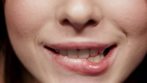 Macro of Sexy Lower Part of Female Person Face Videotaping in Studio