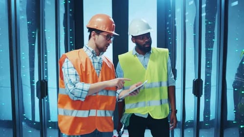 Construction Workers Collaborating Effectively on a Project in a Modern Urban Environment