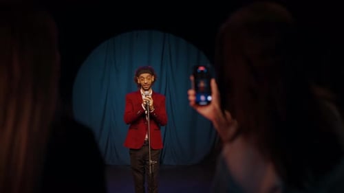 Popular Male Comedian Performing and Ladies Filming His By Smartphones Closeup Visitors of Trendy