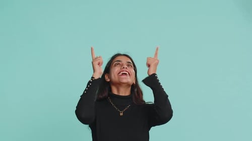 Indian Woman Showing Thumbs Up Pointing Empty Place Advertising Area for Commercial Text Copy Space
