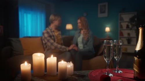 Romantic Evening with Champagne and Candles at Home