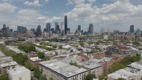 Pulling away from the high rises of Brooklyn and over the rooftops of Cobble Hill