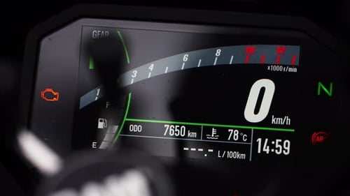 Motorcycle Dashboard Parts - Digital Speedometer Of A Motorcycle. closeup