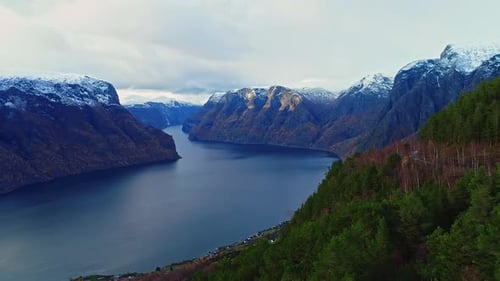 Norway mountains and lakes. Fjords, forests, and archipelago in winter. Aerial drone footage