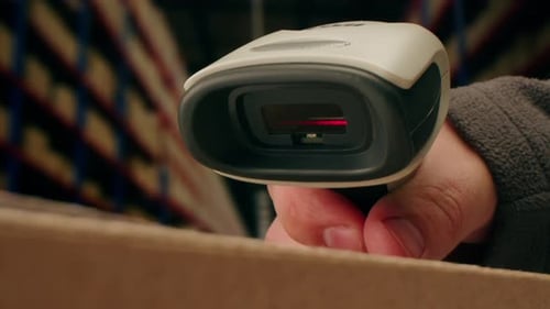 Scanner Scan Delivery Box in Storage Ecommerce Shop Man Packing Goods and Clothes Second Hand