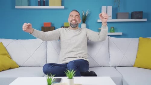 Fun dancing man at home.