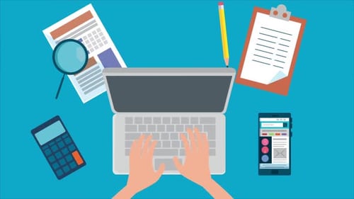 Worker Typing On Laptop In Office