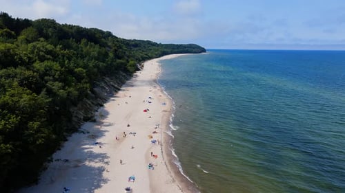Aerial View of Baltic Sea Beach with Swimming People in Wladyslawowo Poland
