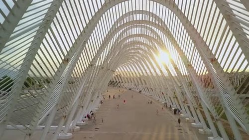 Aerial view of people walking in arches at Olympic Stadium in Athens Greece