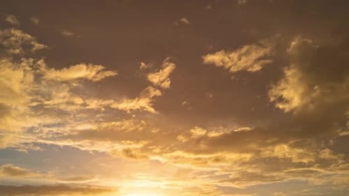 Dramatic Clouds Passing During Golden Hour Sunset Time Lapse