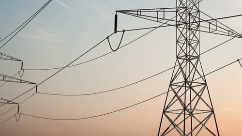 High Voltage Electricity Tower And Power Lines Under The Beautiful Sky. Energy Saving Conception....