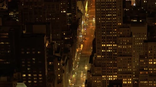 aerial view of city at night. traffic lights. urban street avenue background