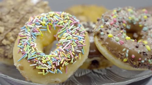 Assorted Donuts with Colorful Toppings and Icing