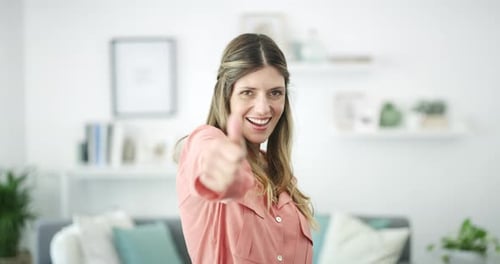 Smiling Woman Gives a Thumbs Up