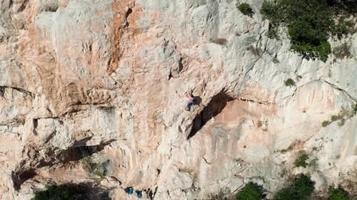 Rock climber climbing the rock 8