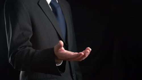 Businessman Show Hologram of Global Business Communication Allusive Technology