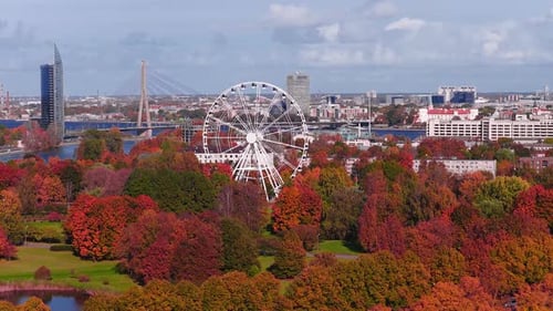 Aerial View of Riga with Autumn Foliage Ferris Wheel and Skyline